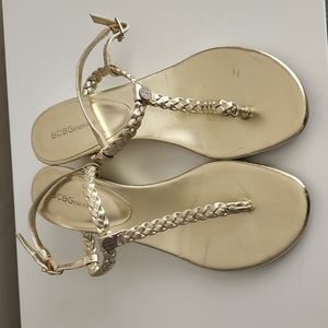 Gold BCBG sandals.